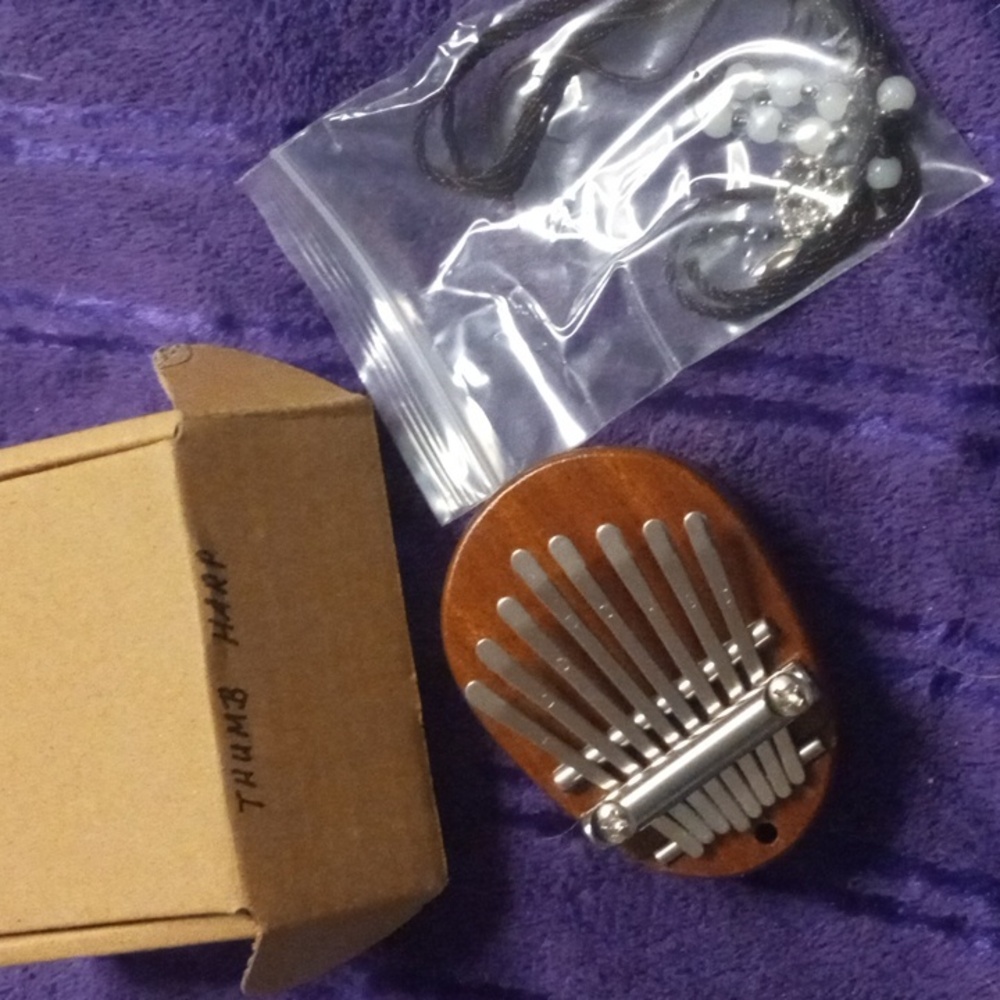 Vintage thumb harp